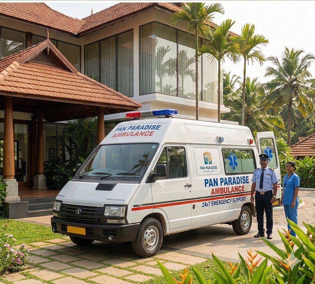 The PAN Paradise ambulance under the portico with its driver and a nurse