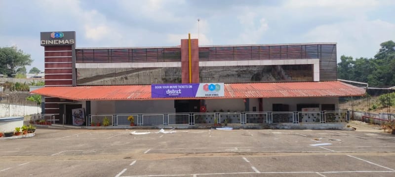 The PAN Cinemas building at Arakkunnam, with its sign above the entrance and the forecourt in front